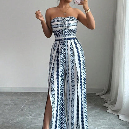 👗💙 Geometric jumpsuit with halter neckline and side slit!