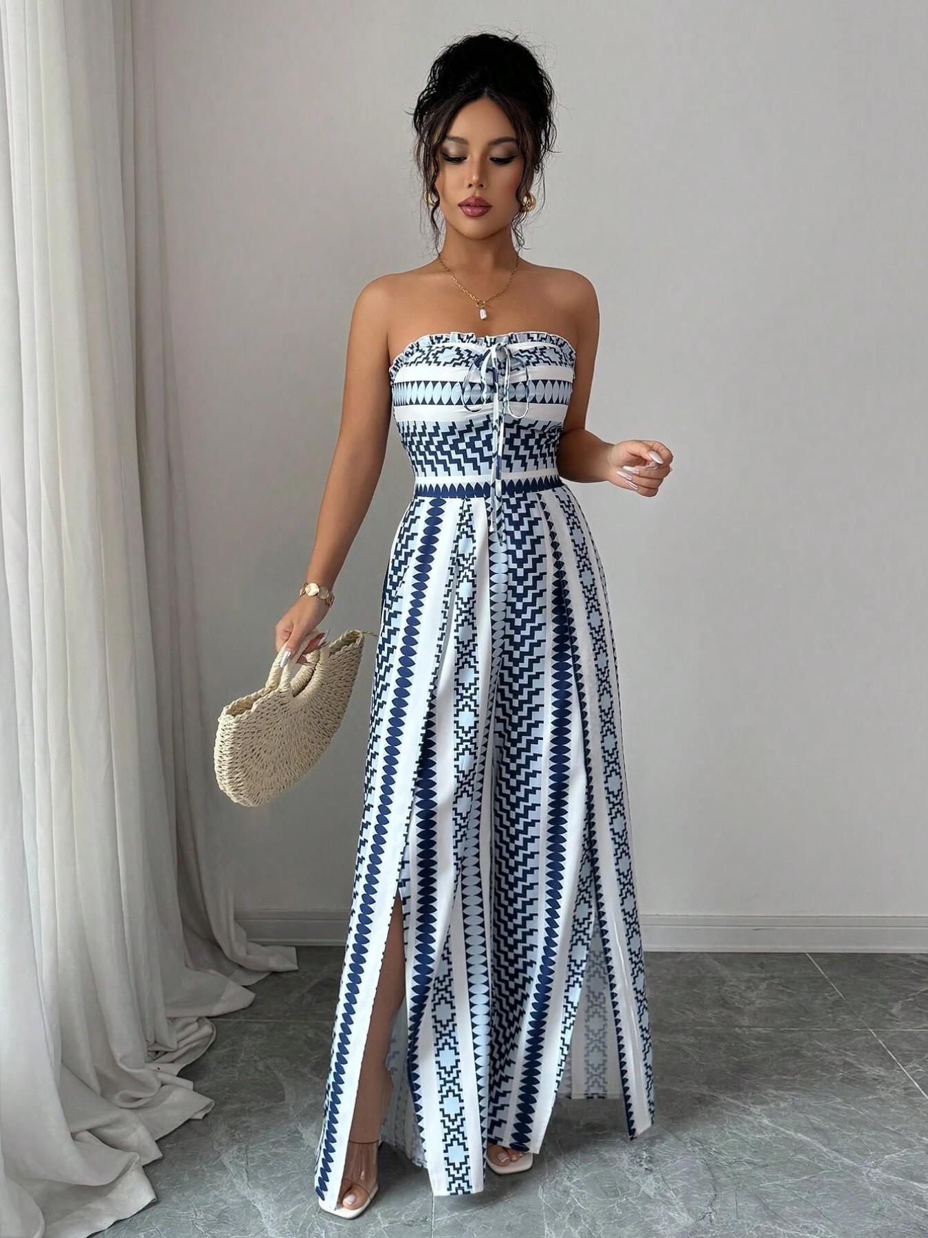 👗💙 Geometric jumpsuit with halter neckline and side slit!